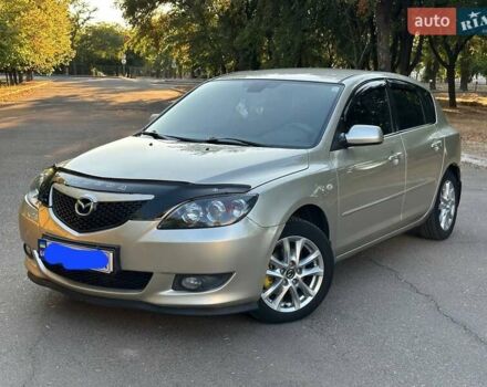 Бежевый Мазда 3, объемом двигателя 1.6 л и пробегом 235 тыс. км за 4600 $, фото 1 на Automoto.ua