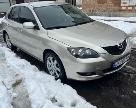 Бежевый Мазда 3, объемом двигателя 1.6 л и пробегом 244 тыс. км за 4650 $, фото 1 на Automoto.ua