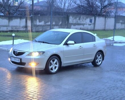 Бежевый Мазда 3, объемом двигателя 1.6 л и пробегом 195 тыс. км за 5999 $, фото 1 на Automoto.ua