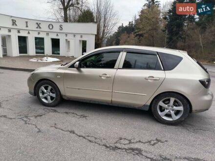 Бежевый Мазда 3, объемом двигателя 1.6 л и пробегом 158 тыс. км за 4500 $, фото 1 на Automoto.ua