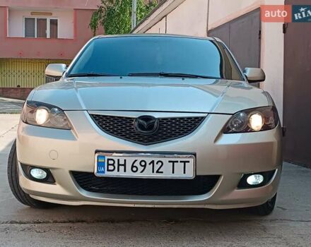 Бежевый Мазда 3, объемом двигателя 1.6 л и пробегом 280 тыс. км за 4999 $, фото 1 на Automoto.ua