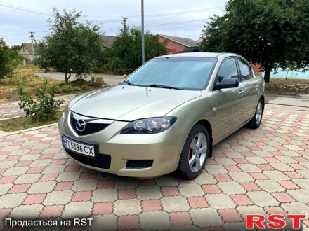 Бежевый Мазда 3, объемом двигателя 1.6 л и пробегом 178 тыс. км за 5200 $, фото 1 на Automoto.ua