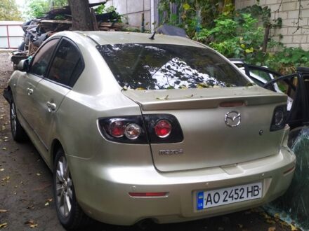 Бежевый Мазда 3, объемом двигателя 1.6 л и пробегом 100 тыс. км за 400 $, фото 1 на Automoto.ua