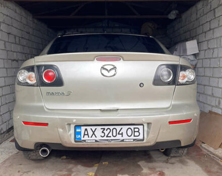Бежевый Мазда 3, объемом двигателя 2 л и пробегом 147 тыс. км за 5000 $, фото 1 на Automoto.ua