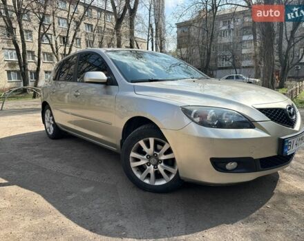 Бежевый Мазда 3, объемом двигателя 1.6 л и пробегом 190 тыс. км за 5600 $, фото 1 на Automoto.ua