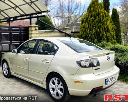 Бежевий Мазда 3, об'ємом двигуна 2 л та пробігом 180 тис. км за 4750 $, фото 1 на Automoto.ua
