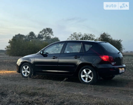 Черный Мазда 3, объемом двигателя 1.6 л и пробегом 155 тыс. км за 4300 $, фото 2 на Automoto.ua