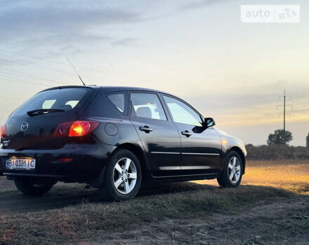 Черный Мазда 3, объемом двигателя 1.6 л и пробегом 155 тыс. км за 4300 $, фото 6 на Automoto.ua