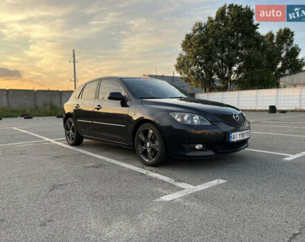 Черный Мазда 3, объемом двигателя 2 л и пробегом 215 тыс. км за 4050 $, фото 1 на Automoto.ua