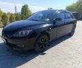Черный Мазда 3, объемом двигателя 1.6 л и пробегом 327 тыс. км за 4000 $, фото 1 на Automoto.ua