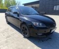 Черный Мазда 3, объемом двигателя 1.6 л и пробегом 327 тыс. км за 4000 $, фото 1 на Automoto.ua