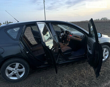 Черный Мазда 3, объемом двигателя 1.6 л и пробегом 155 тыс. км за 4300 $, фото 11 на Automoto.ua