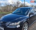 Черный Мазда 3, объемом двигателя 1.6 л и пробегом 285 тыс. км за 4500 $, фото 1 на Automoto.ua