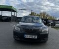 Черный Мазда 3, объемом двигателя 1.6 л и пробегом 359 тыс. км за 3400 $, фото 1 на Automoto.ua