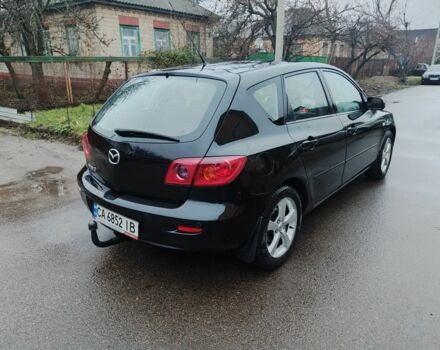 Чорний Мазда 3, об'ємом двигуна 1.6 л та пробігом 242 тис. км за 4250 $, фото 4 на Automoto.ua