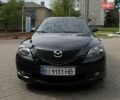 Черный Мазда 3, объемом двигателя 1.6 л и пробегом 223 тыс. км за 4800 $, фото 1 на Automoto.ua