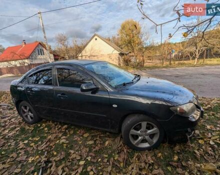 Черный Мазда 3, объемом двигателя 1.6 л и пробегом 300 тыс. км за 4100 $, фото 2 на Automoto.ua