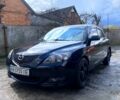 Черный Мазда 3, объемом двигателя 1.6 л и пробегом 260 тыс. км за 3650 $, фото 1 на Automoto.ua