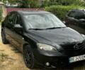 Черный Мазда 3, объемом двигателя 2 л и пробегом 413 тыс. км за 2500 $, фото 1 на Automoto.ua