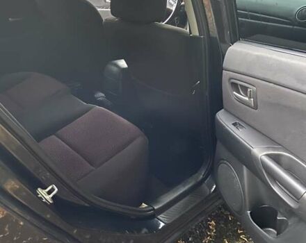 Черный Мазда 3, объемом двигателя 1.6 л и пробегом 171 тыс. км за 3600 $, фото 16 на Automoto.ua