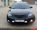 Черный Мазда 3, объемом двигателя 2 л и пробегом 327 тыс. км за 4000 $, фото 1 на Automoto.ua
