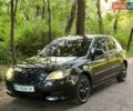 Чорний Мазда 3, об'ємом двигуна 1.35 л та пробігом 321 тис. км за 2700 $, фото 7 на Automoto.ua