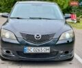Чорний Мазда 3, об'ємом двигуна 1.6 л та пробігом 260 тис. км за 2499 $, фото 1 на Automoto.ua