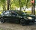 Чорний Мазда 3, об'ємом двигуна 1.35 л та пробігом 321 тис. км за 2700 $, фото 1 на Automoto.ua