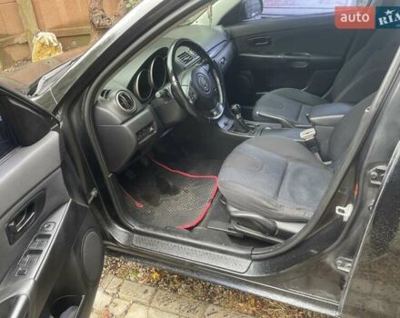 Чорний Мазда 3, об'ємом двигуна 2 л та пробігом 274 тис. км за 4200 $, фото 15 на Automoto.ua