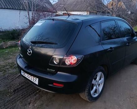 Чорний Мазда 3, об'ємом двигуна 1.56 л та пробігом 376 тис. км за 4400 $, фото 5 на Automoto.ua