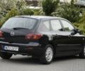 Черный Мазда 3, объемом двигателя 1.4 л и пробегом 227 тыс. км за 1900 $, фото 2 на Automoto.ua