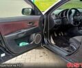Черный Мазда 3, объемом двигателя 2 л и пробегом 327 тыс. км за 4000 $, фото 10 на Automoto.ua