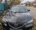 Черный Мазда 3, объемом двигателя 1.6 л и пробегом 300 тыс. км за 4100 $, фото 1 на Automoto.ua