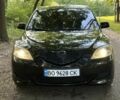 Черный Мазда 3, объемом двигателя 1.4 л и пробегом 321 тыс. км за 2850 $, фото 1 на Automoto.ua