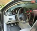 Чорний Мазда 3, об'ємом двигуна 1.35 л та пробігом 321 тис. км за 2700 $, фото 9 на Automoto.ua
