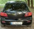 Черный Мазда 3, объемом двигателя 1.4 л и пробегом 321 тыс. км за 2850 $, фото 7 на Automoto.ua