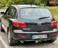 Чорний Мазда 3, об'ємом двигуна 1.6 л та пробігом 242 тис. км за 2399 $, фото 5 на Automoto.ua