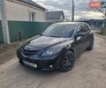 Черный Мазда 3, объемом двигателя 2 л и пробегом 330 тыс. км за 3000 $, фото 2 на Automoto.ua