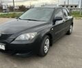 Черный Мазда 3, объемом двигателя 1.3 л и пробегом 190 тыс. км за 3200 $, фото 1 на Automoto.ua