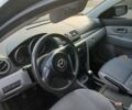 Черный Мазда 3, объемом двигателя 1.35 л и пробегом 285 тыс. км за 4500 $, фото 6 на Automoto.ua
