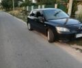 Черный Мазда 3, объемом двигателя 1.35 л и пробегом 285 тыс. км за 4500 $, фото 1 на Automoto.ua