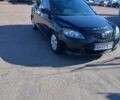 Черный Мазда 3, объемом двигателя 1.35 л и пробегом 285 тыс. км за 3900 $, фото 1 на Automoto.ua