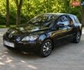 Чорний Мазда 3, об'ємом двигуна 1.4 л та пробігом 340 тис. км за 3700 $, фото 1 на Automoto.ua