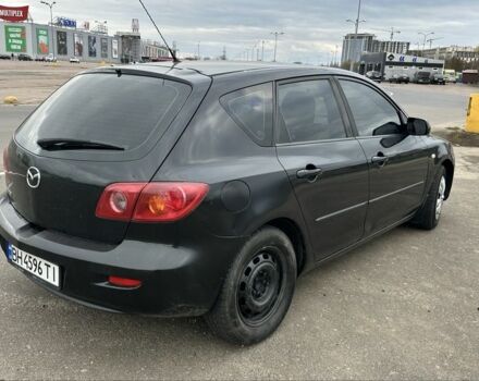Черный Мазда 3, объемом двигателя 1.3 л и пробегом 190 тыс. км за 3200 $, фото 3 на Automoto.ua