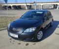Черный Мазда 3, объемом двигателя 1.35 л и пробегом 181 тыс. км за 3800 $, фото 1 на Automoto.ua