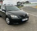 Черный Мазда 3, объемом двигателя 1.3 л и пробегом 190 тыс. км за 3200 $, фото 1 на Automoto.ua
