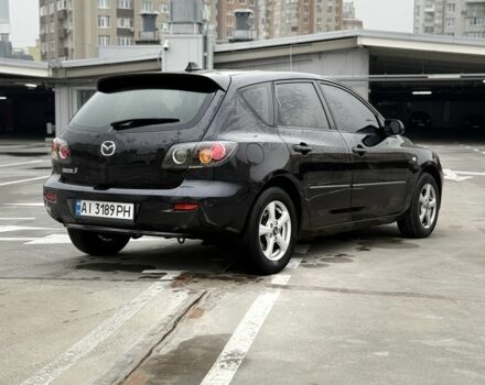 Черный Мазда 3, объемом двигателя 1.6 л и пробегом 300 тыс. км за 4000 $, фото 3 на Automoto.ua