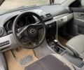 Чорний Мазда 3, об'ємом двигуна 1.6 л та пробігом 300 тис. км за 1398 $, фото 4 на Automoto.ua