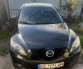 Черный Мазда 3, объемом двигателя 1.6 л и пробегом 200 тыс. км за 2200 $, фото 1 на Automoto.ua
