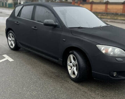 Черный Мазда 3, объемом двигателя 2 л и пробегом 350 тыс. км за 3000 $, фото 3 на Automoto.ua